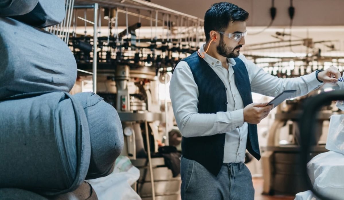 Small Business owner checking the serial numbers of the products